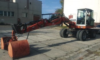 Použité kolové rypadlo TEREX upravené pro nakládku uhlí v maloobchodním skladu
