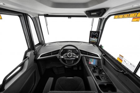 Ergonomická kabina s přehledným ovládáním a lepším výhledem zvyšuje komfort i bezpečnost práce.